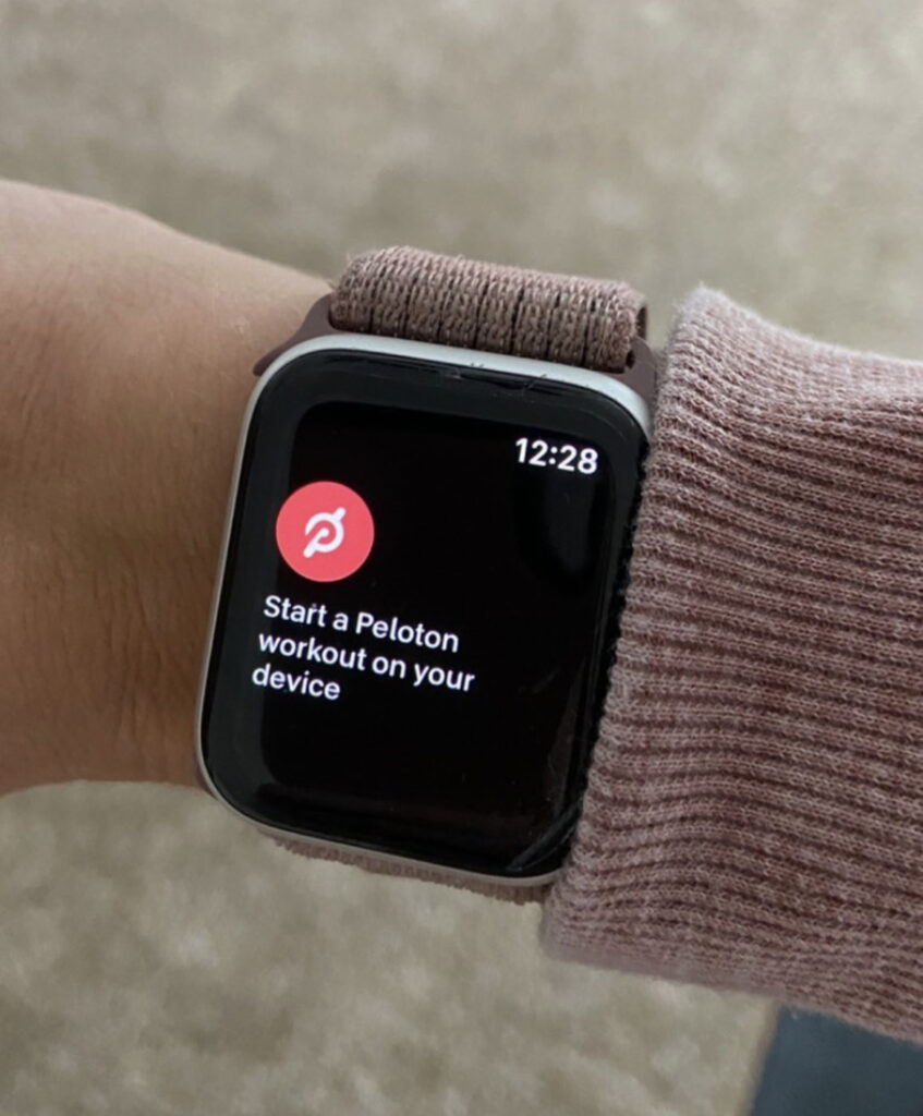 The Peloton app is open on the watch, waiting for a class to be started on the Bike or Tread.