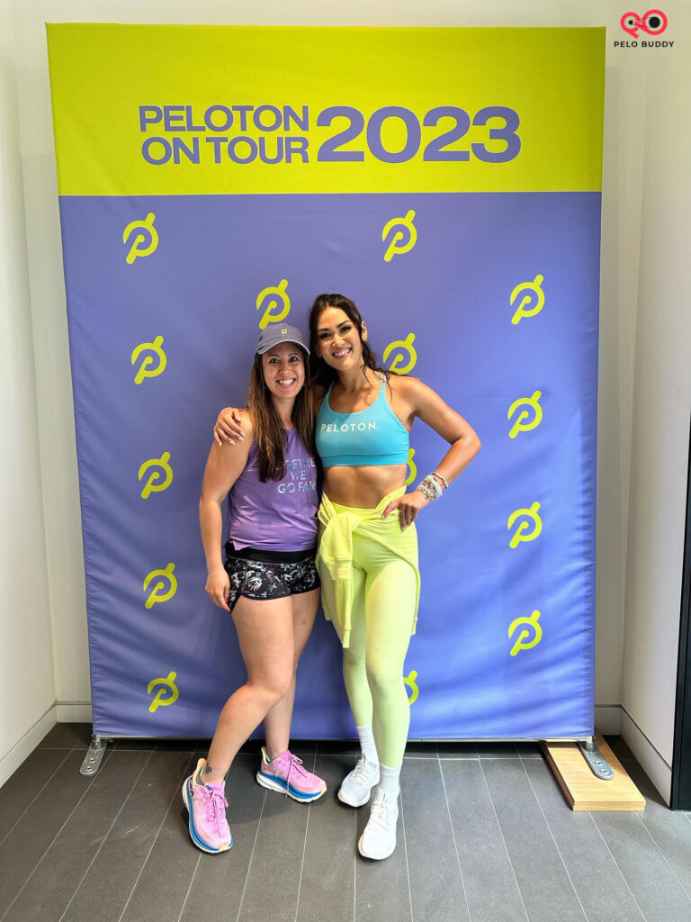 Photo with the instructor after the class taping is over for backstage pass ticket holders at Peloton On Tour.