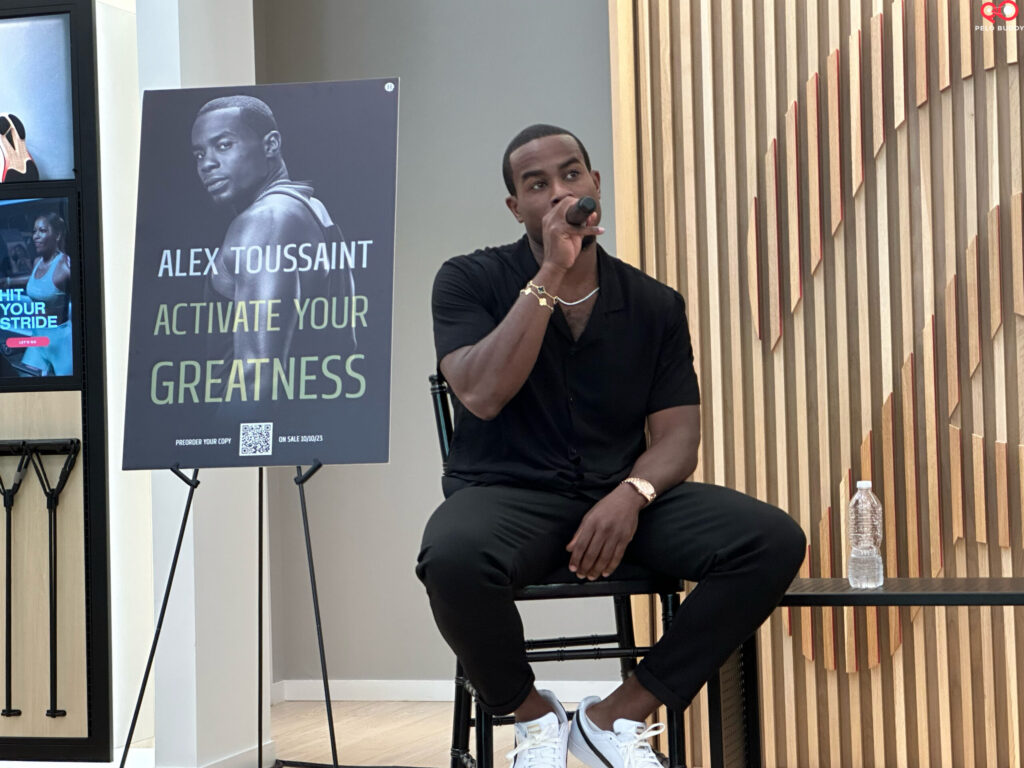 Alex Toussaint speaking during the "Activate Your Greatness" panel at the Peloton on Tour in Atlanta.