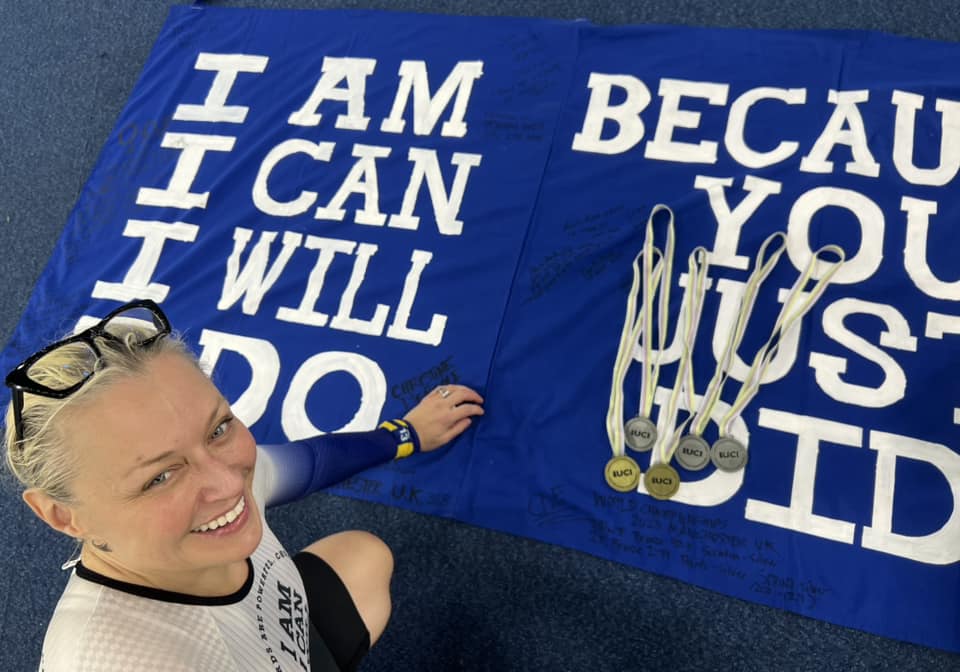 Christine D'Ercole and her 5 medals from the 2023 World Championships. Image credit Angela Bryan @pelo_leaveitonthemand The CDE Project.