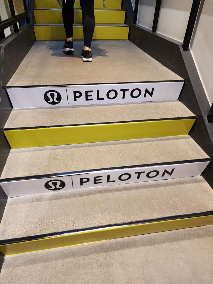 Cobranded stairs at lululemon Lincoln Park Experiential Store. Image credit Braden (#FupaToFabulous).