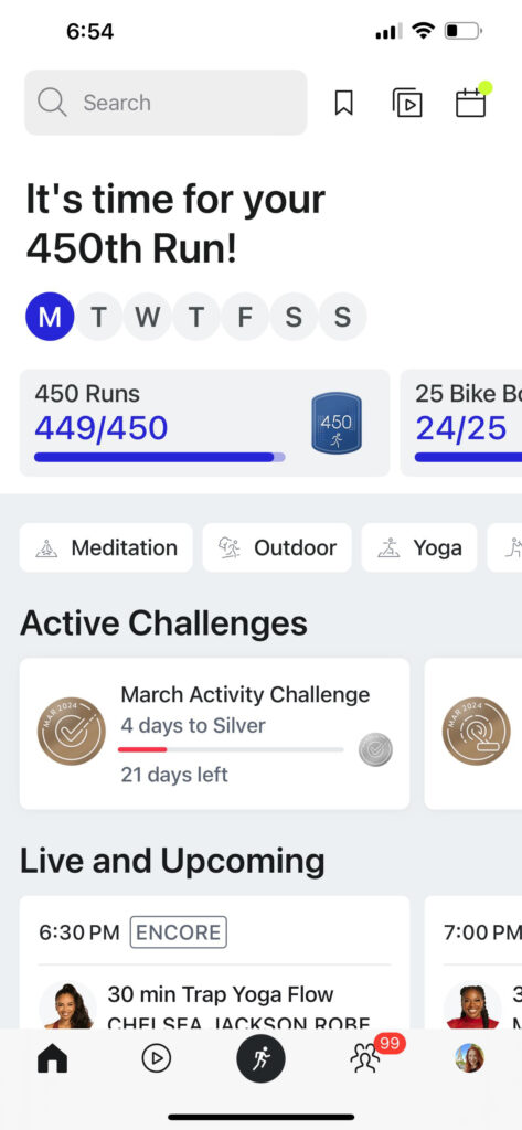 Peloton app showing new milestone alert.
