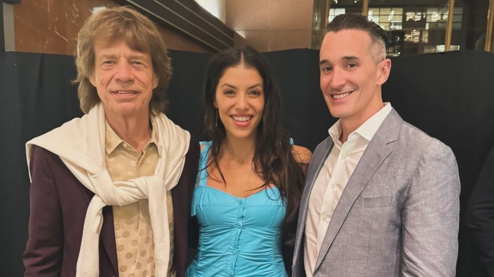 Mick Jagger, Hannah Corbin, and John Ferry.