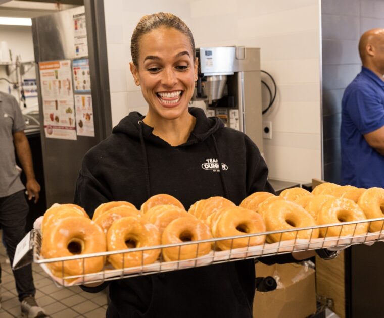 Jess Sims with some donuts at Dunkin.