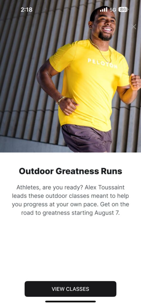 Pop-up notification on Peloton app announcing outdoor Greatness Runs with Alex Toussaint.