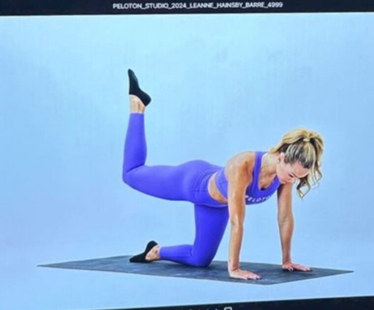 Photo of Leanne Hainsby in Barre pose. Image credit Leanne Hainsby's Instagram.