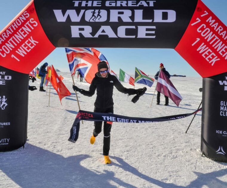 Becs Gentry finishing the Antartica marathon in the great world race. Image credit Great World Race / Mark Conlon