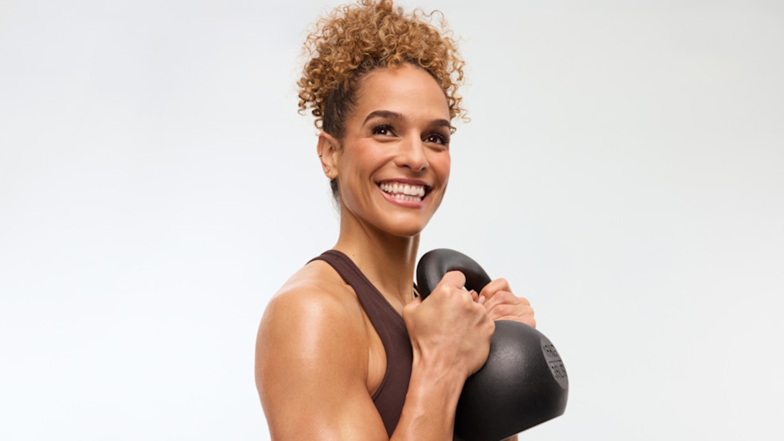 Peloton instructor Jess Sims with a kettlebell.