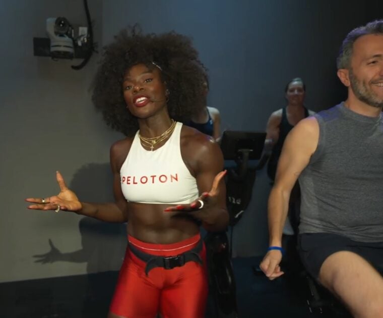 Tunde Oyeneyin teaching from the studio audience during a Peloton class.
