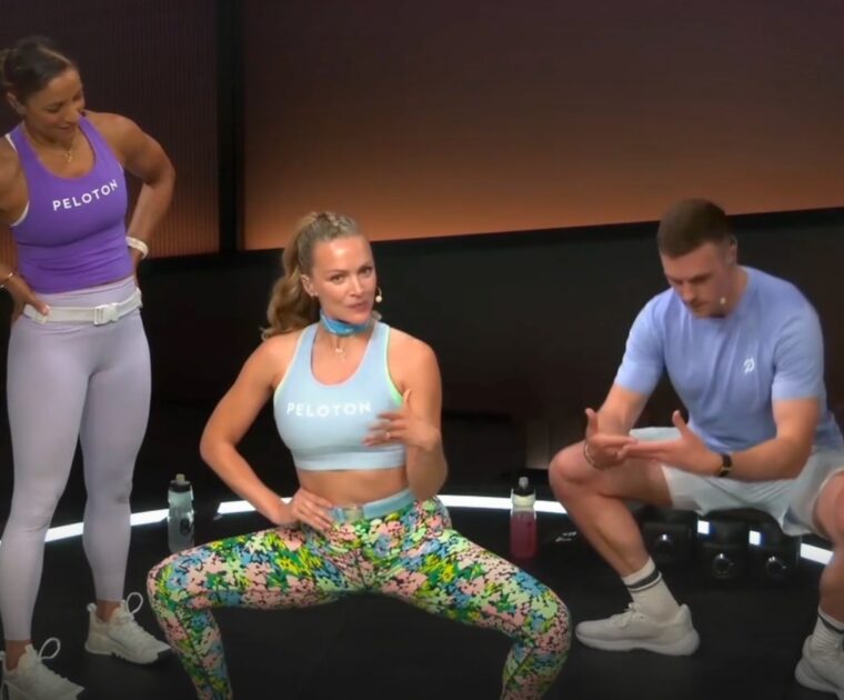 Leanne Hainsby appearing in stretch portion of British Summer Fest Strength class, dropping into a plié.