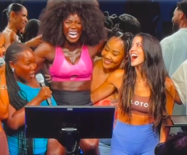 Tunde Oyeneyin being told she won the Sports Illustrated swimsuit contest.