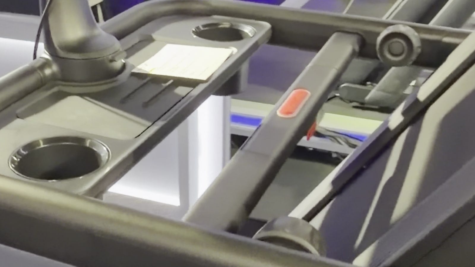 Larger cup holders and traditional speed & incline knobs on Peloton Tread Flex.